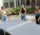 Group of young adults playing pingpong